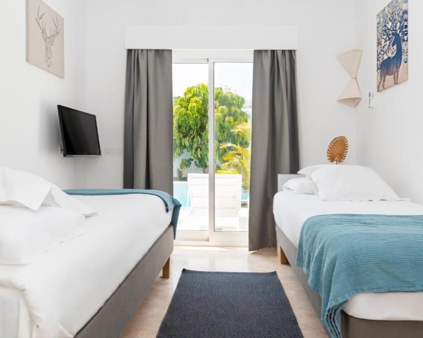 Doppelzimmer mit zwei Einzelbetten in der Villa Premium